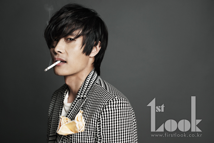 Lee Byung-hun smoking a cigarette (or weed)
